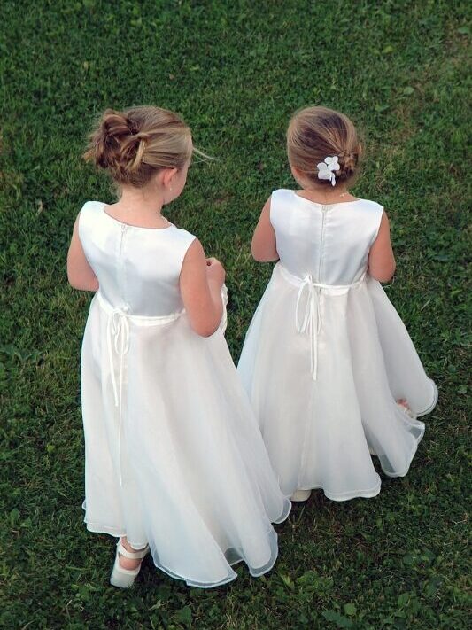 two girls in flower girl dresses