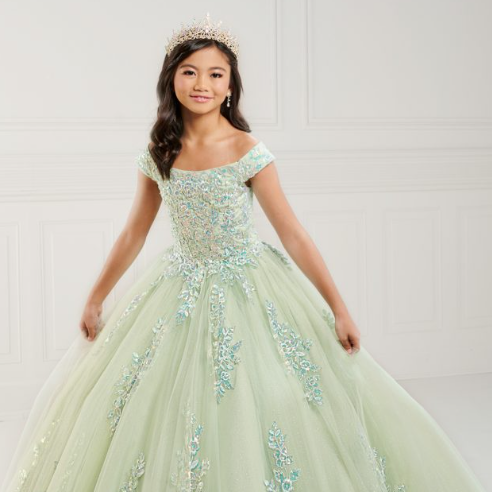 little girl in green embellished pageant dress