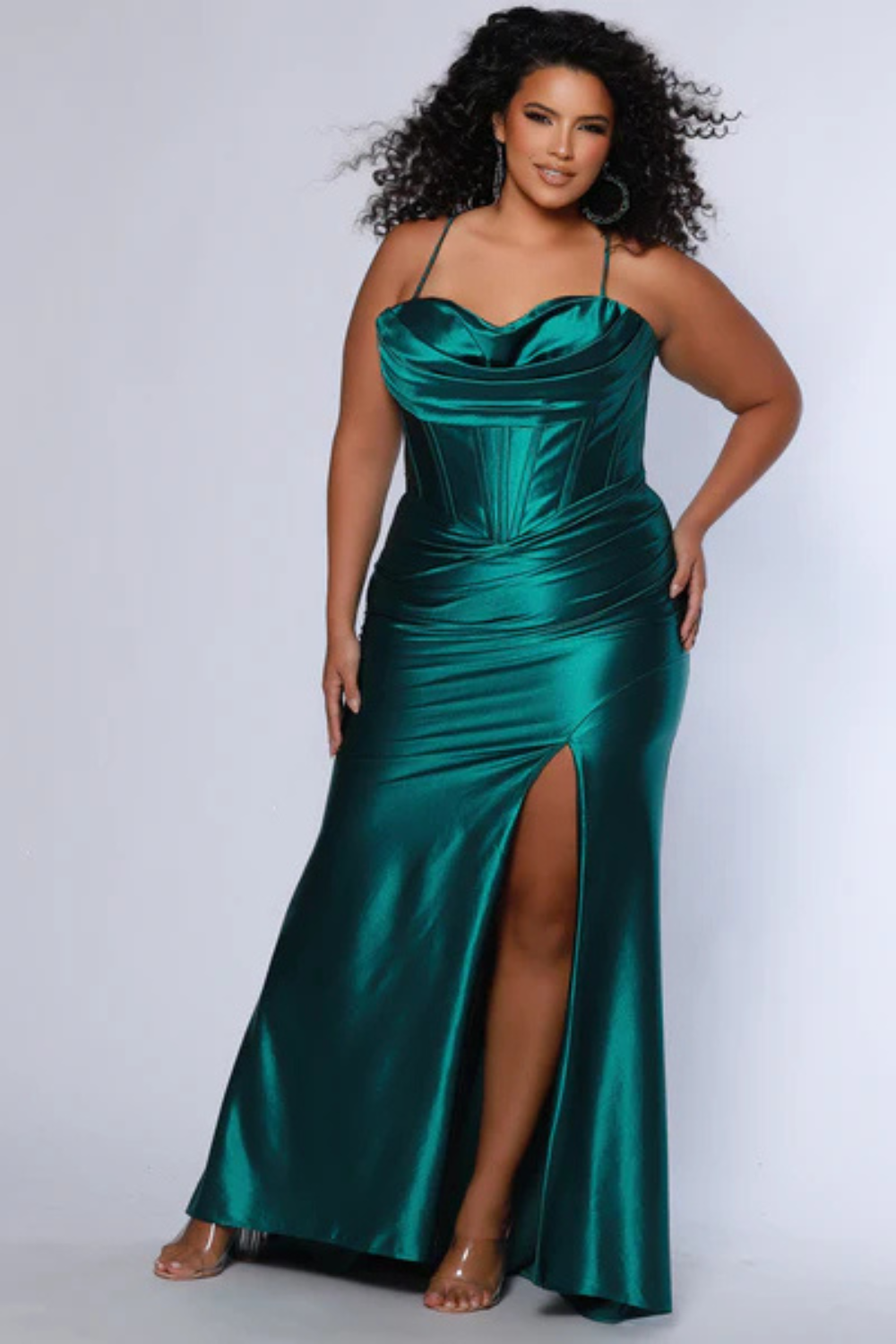 Woman wearing a green formal gown.